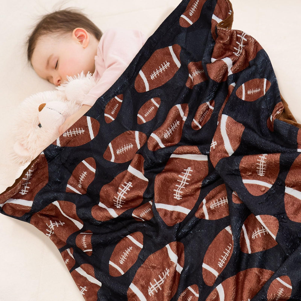 DCOOLGO football baby blanket in stroller use demonstrates portability.