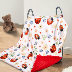 DCOOLGO Ladybug Baby Blanket close-up shows soft fleece for gentle skin comfort during naps.