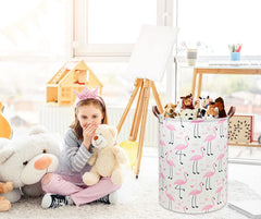 DDBASKET Flamingo Pink used as toy storage in a nursery for easy access.