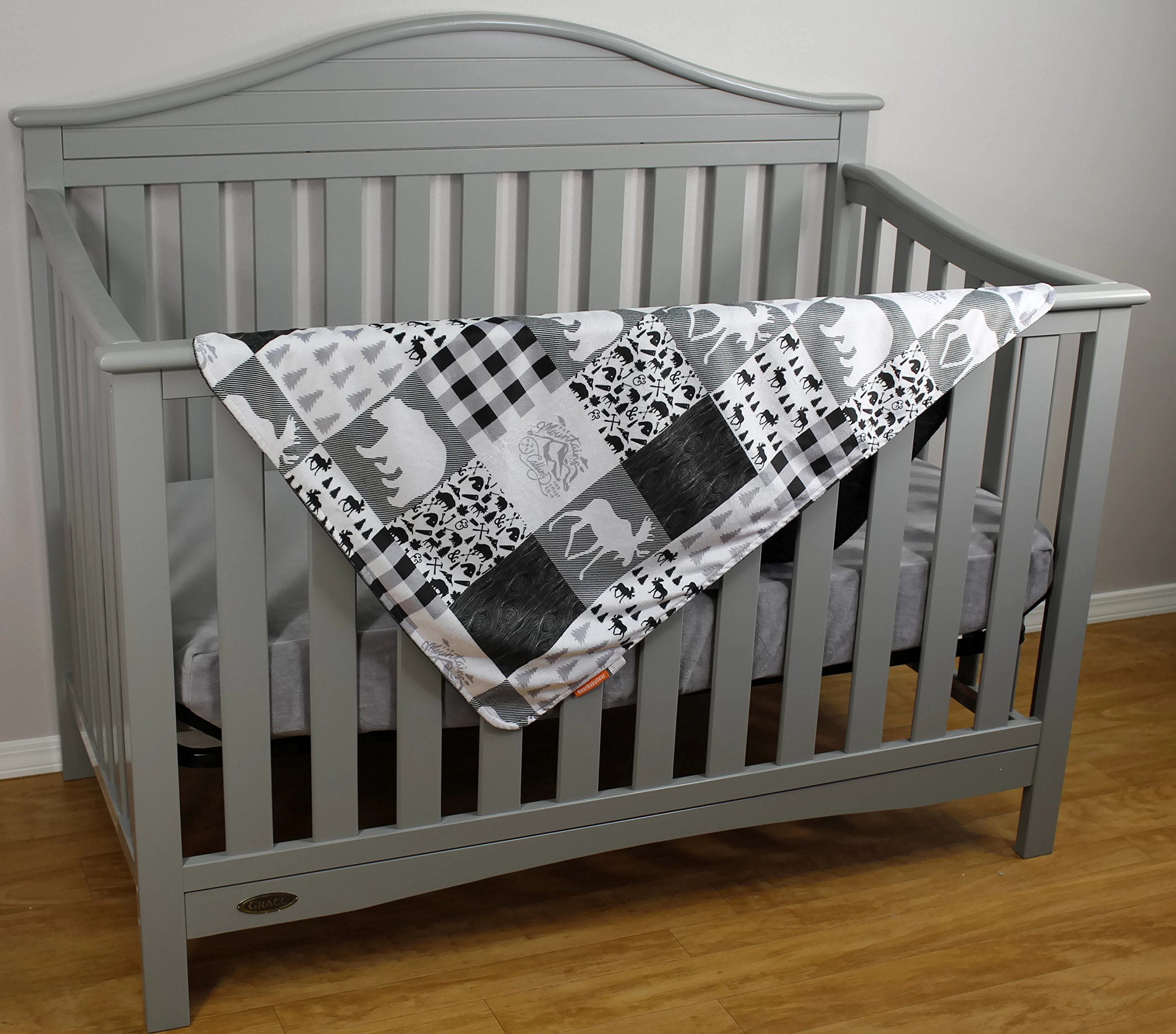 Dear Baby Gear Bears Deluxe Blanket bears pattern provides gentle warmth during tummy time.