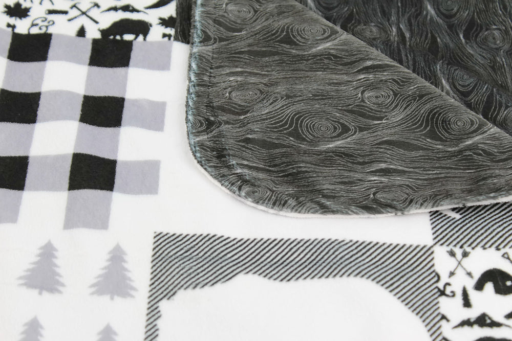 Dear Baby Gear Bears Deluxe Blanket moose motif offers cozy travel comfort.