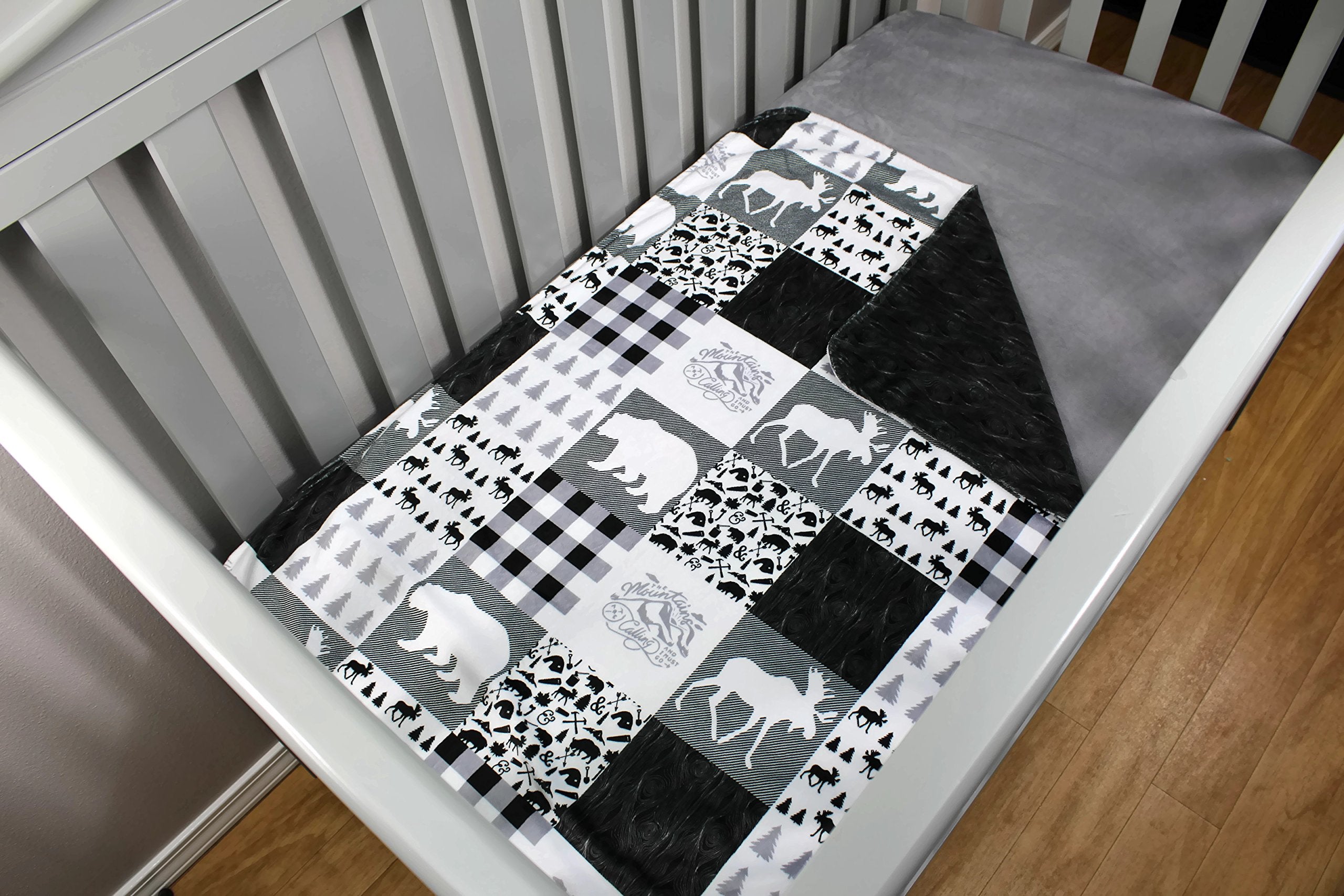 Dear Baby Gear Bears Deluxe Blanket woodgrain faux quilt detail adds stylish nursery decor.