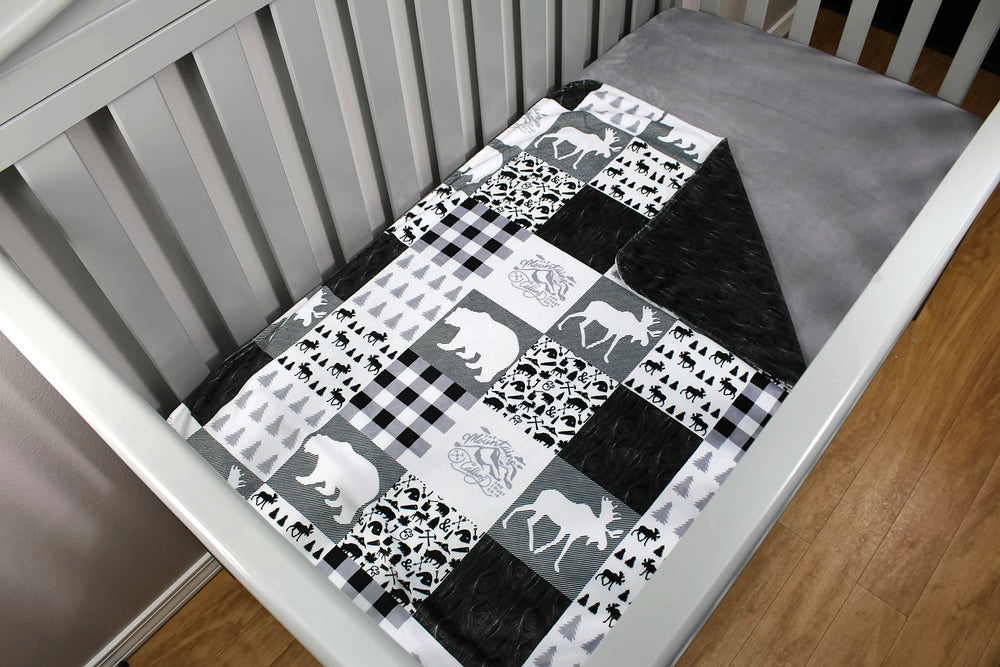Dear Baby Gear Bears Deluxe Blanket woodgrain faux quilt detail adds stylish nursery decor.
