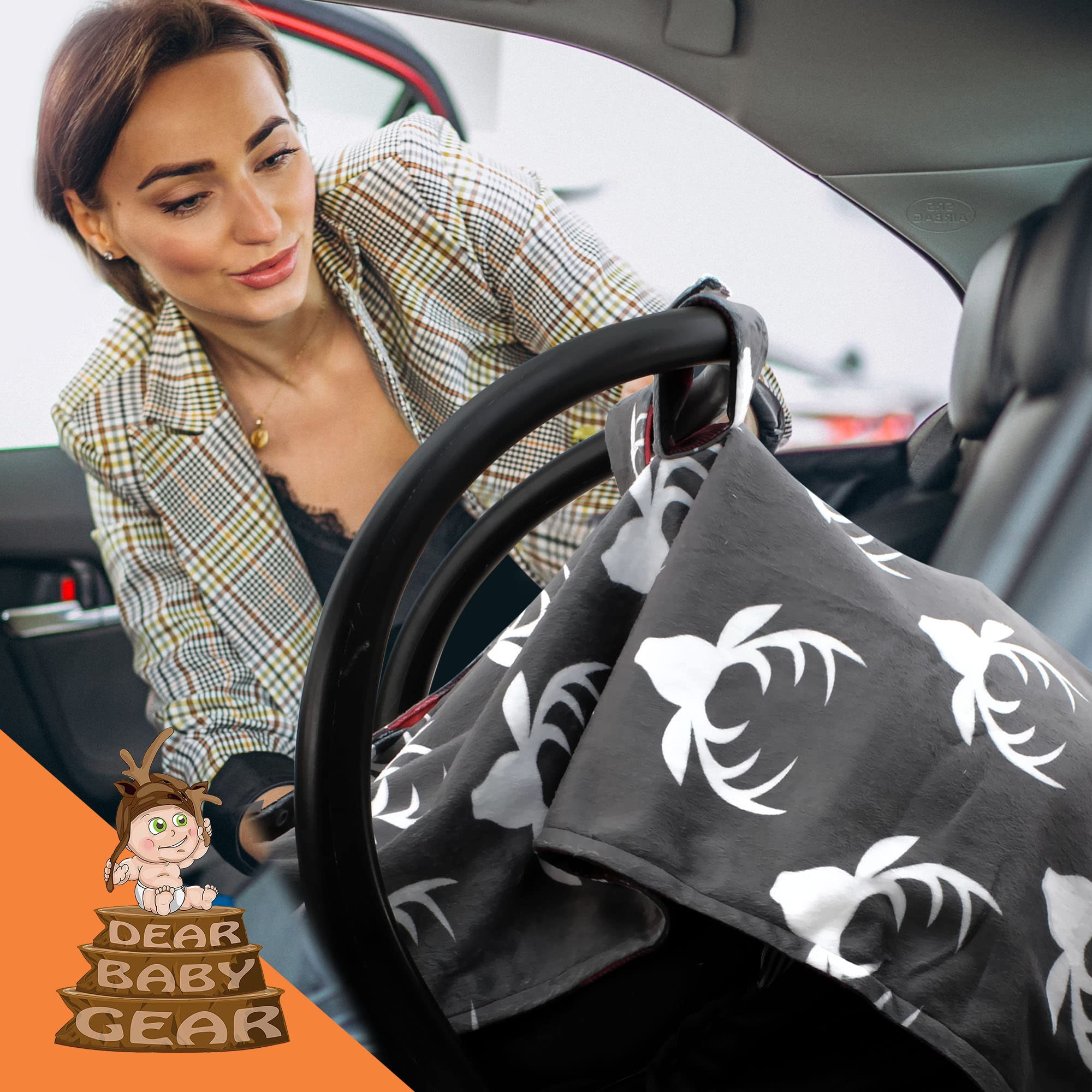Dear Baby Gear infant carrier cover doubles as a nursing shield for hands-free feeding.