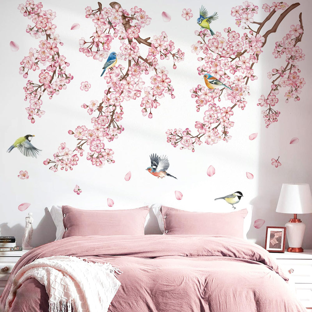 DecalMile cherry blossom tree branch wall decal creates a soft focal point in a bedroom