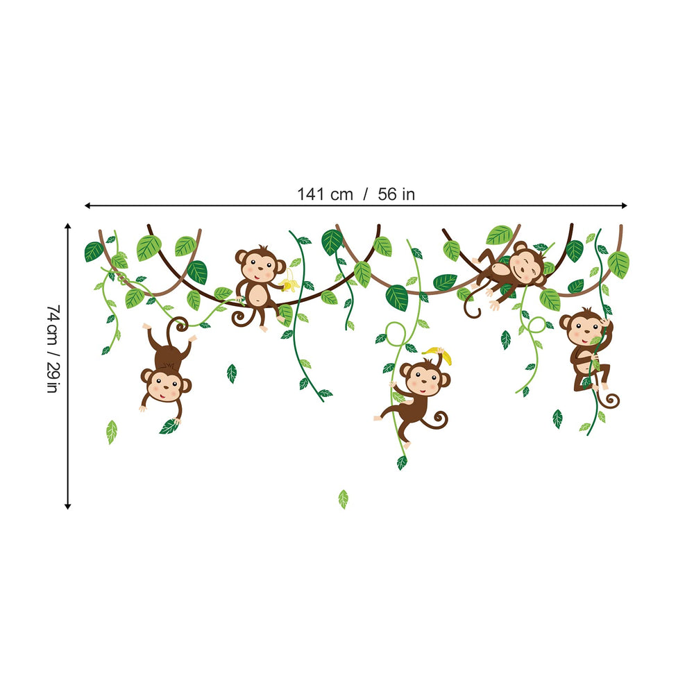 Decalmile monkey climbing tree wall decal near a crib creates a cozy, story-ready corner.