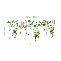 Decalmile monkey climbing tree wall decal near a crib creates a cozy, story-ready corner.