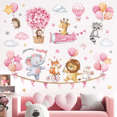 Decalmile pink animal hot air balloon giraffe wall decal adds cheerful whimsy to nursery.