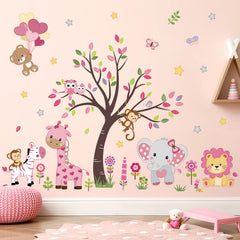 decalmile pink animal tree wall decal elephant family fosters a calm corner for story time.