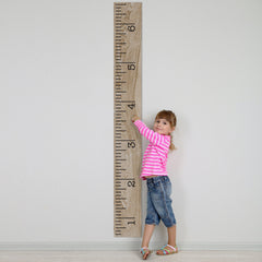 Decals for the Wall growth chart anti-glare matte vinyl visible under bright lighting.
