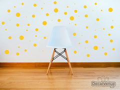 DecalVenue yellow polka dots on textured wall, easy repositioning for kids room styling.