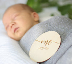 Declan & Delaney week-1-milestone-disc captures early growth in photos