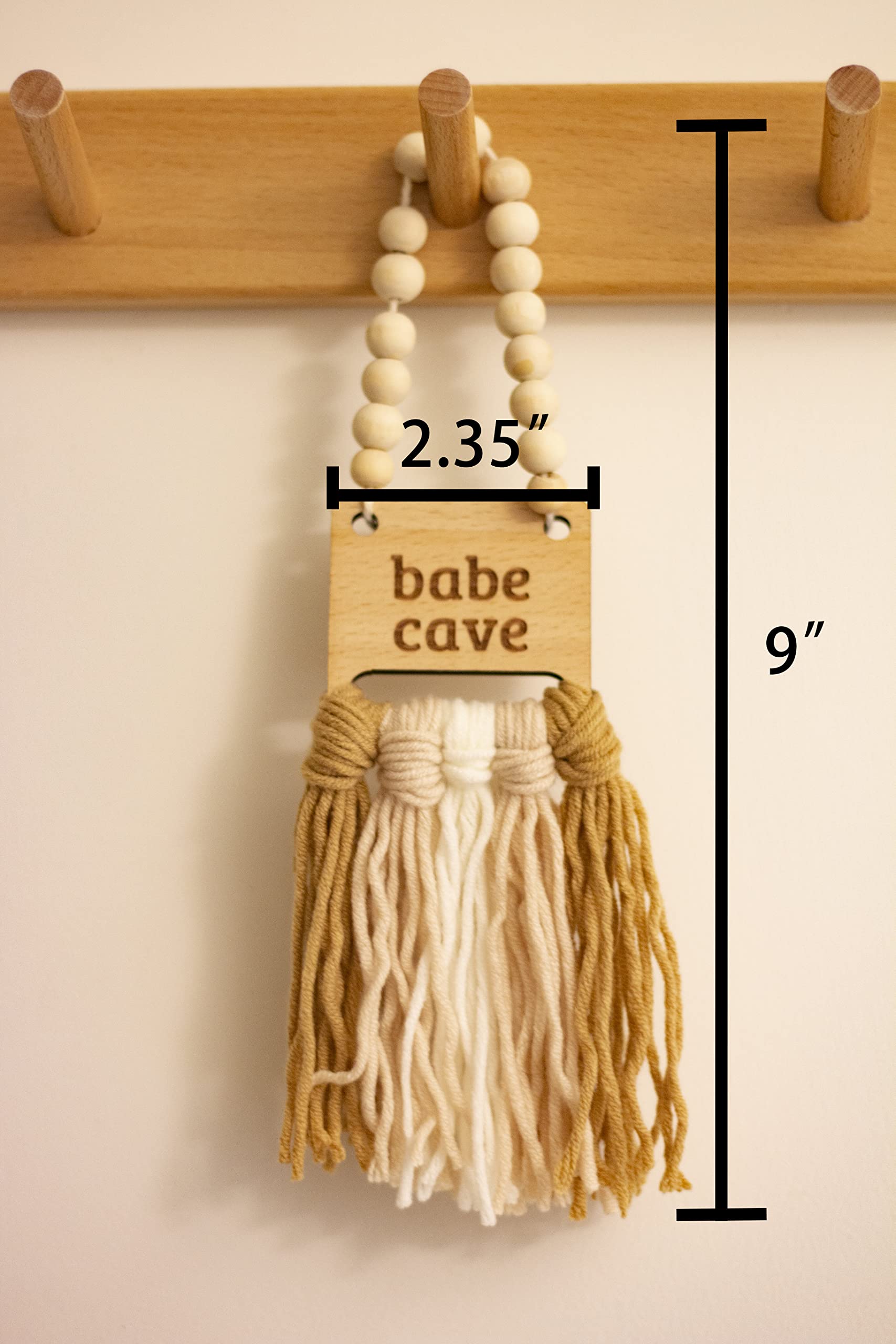 Decocove Babe Cave Sign neutral nursery decor for versatile styling.