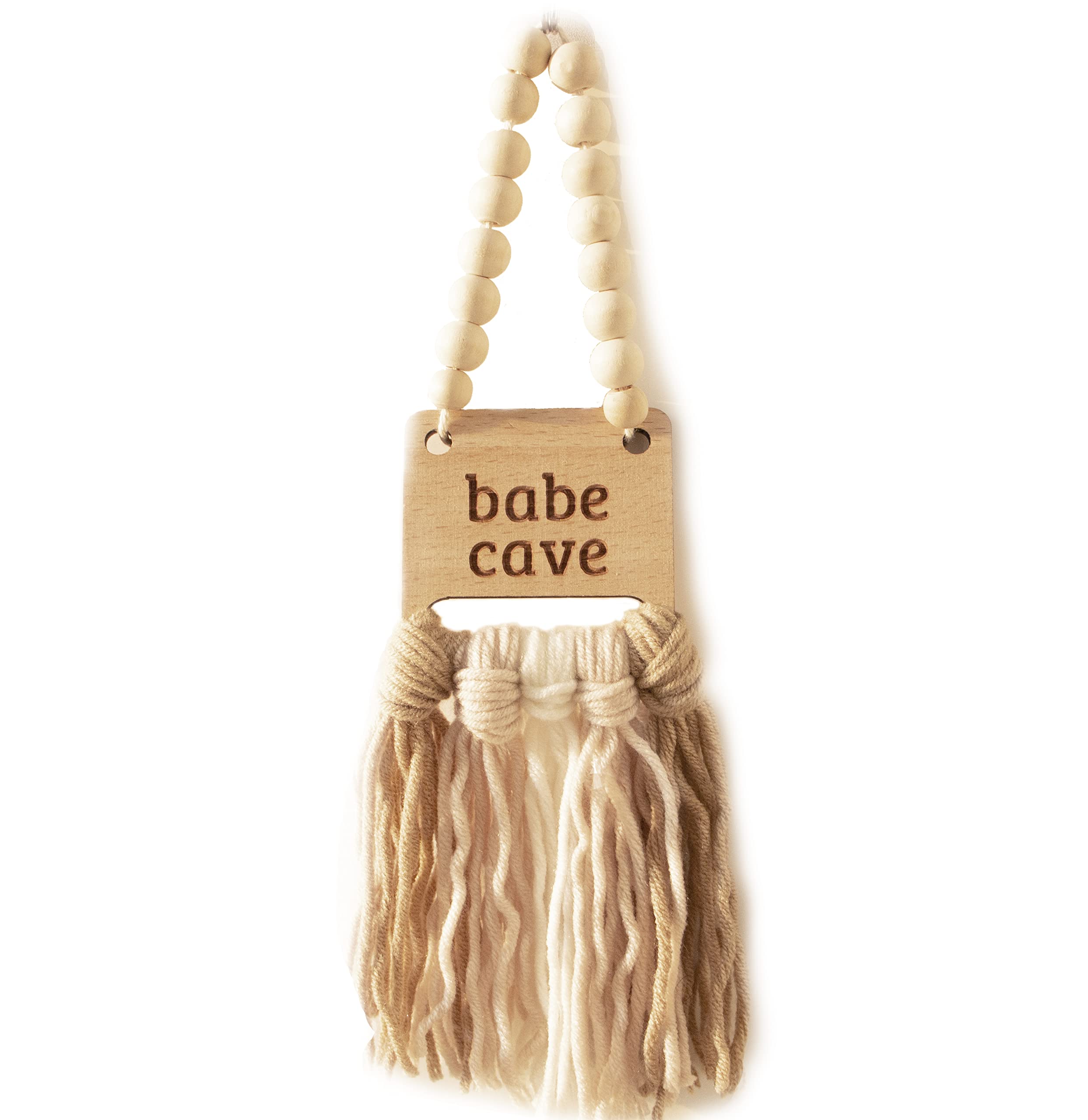 Decocove Babe Cave Sign wood bead garland adds cozy nursery style.