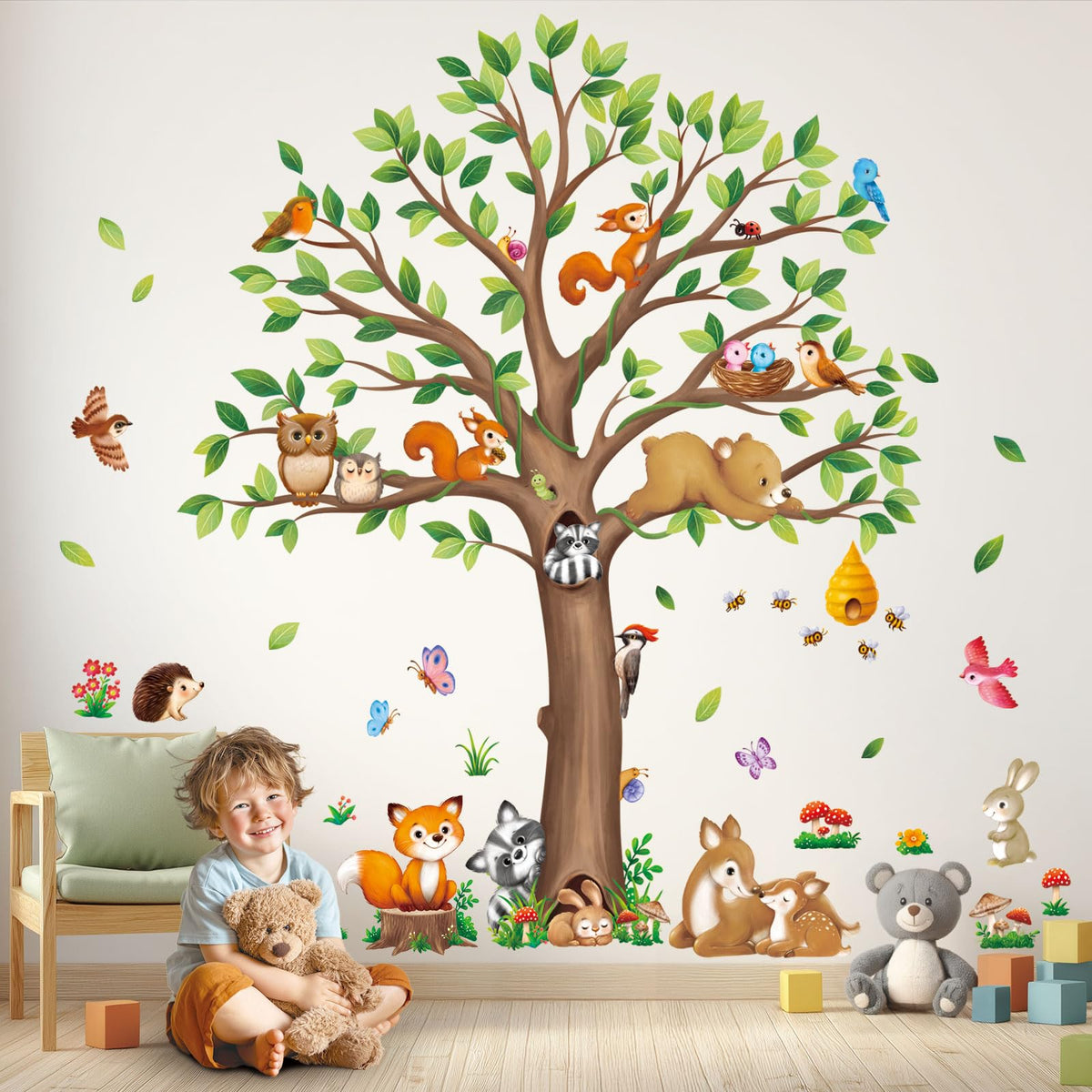 DECOWALL Woodland large tree decal creates a warm play space for children.