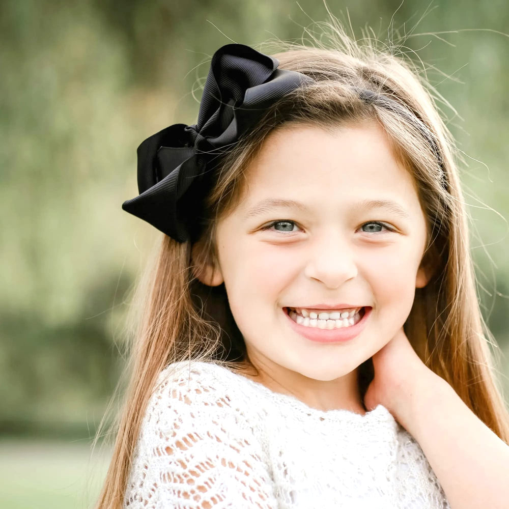 DED 16 Pack Hair Bows baby girl headband worn for comfortable daily wear.