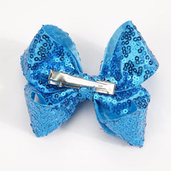 DED baby girls glitter bow detail with shimmering ribbon.
