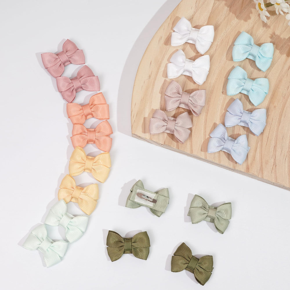 DED baby-hair-bows on head demonstrates gentle, face-framing accessory ideal for photos