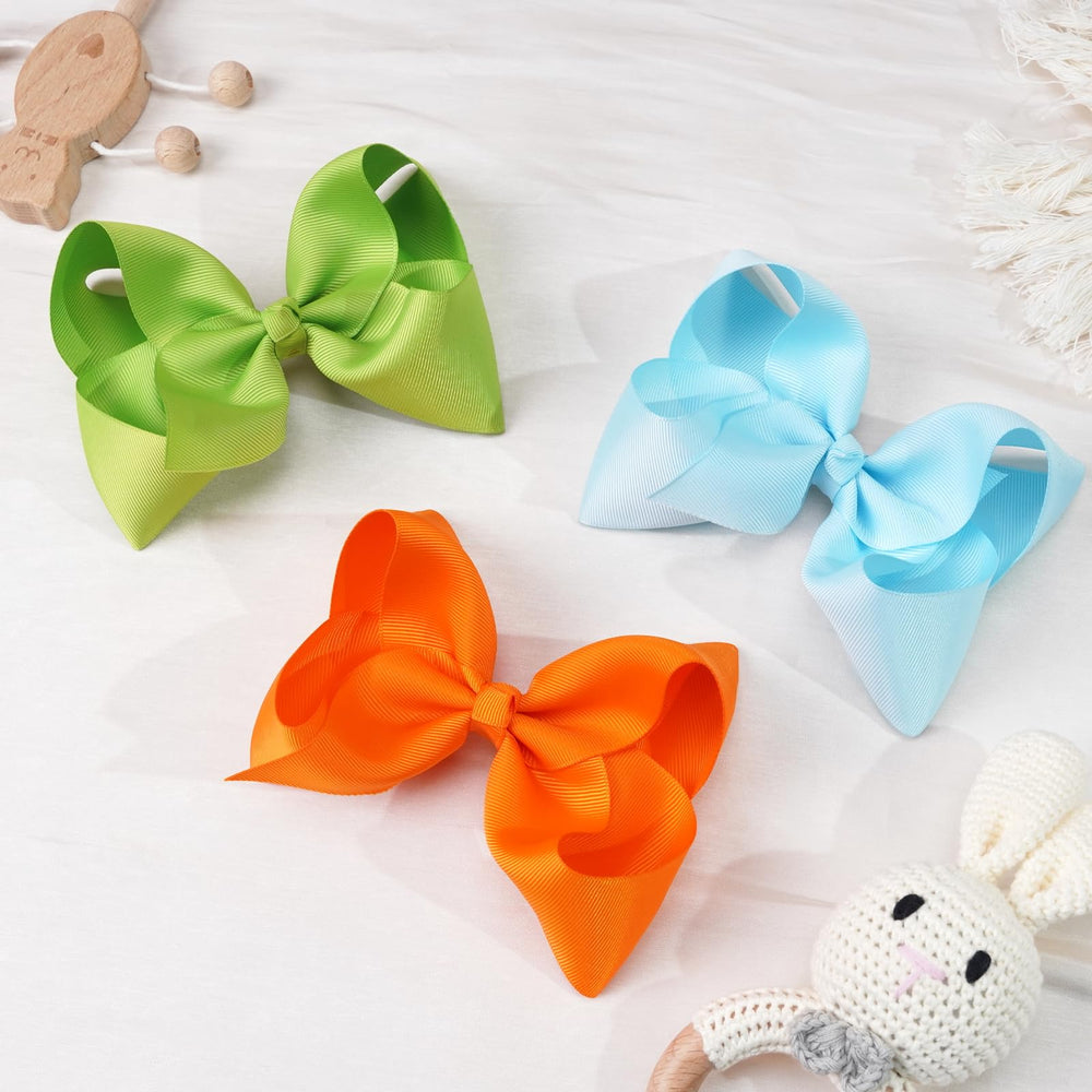 DED kids hair bows styled for school or party looks.