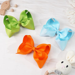 DED kids hair bows styled for school or party looks.
