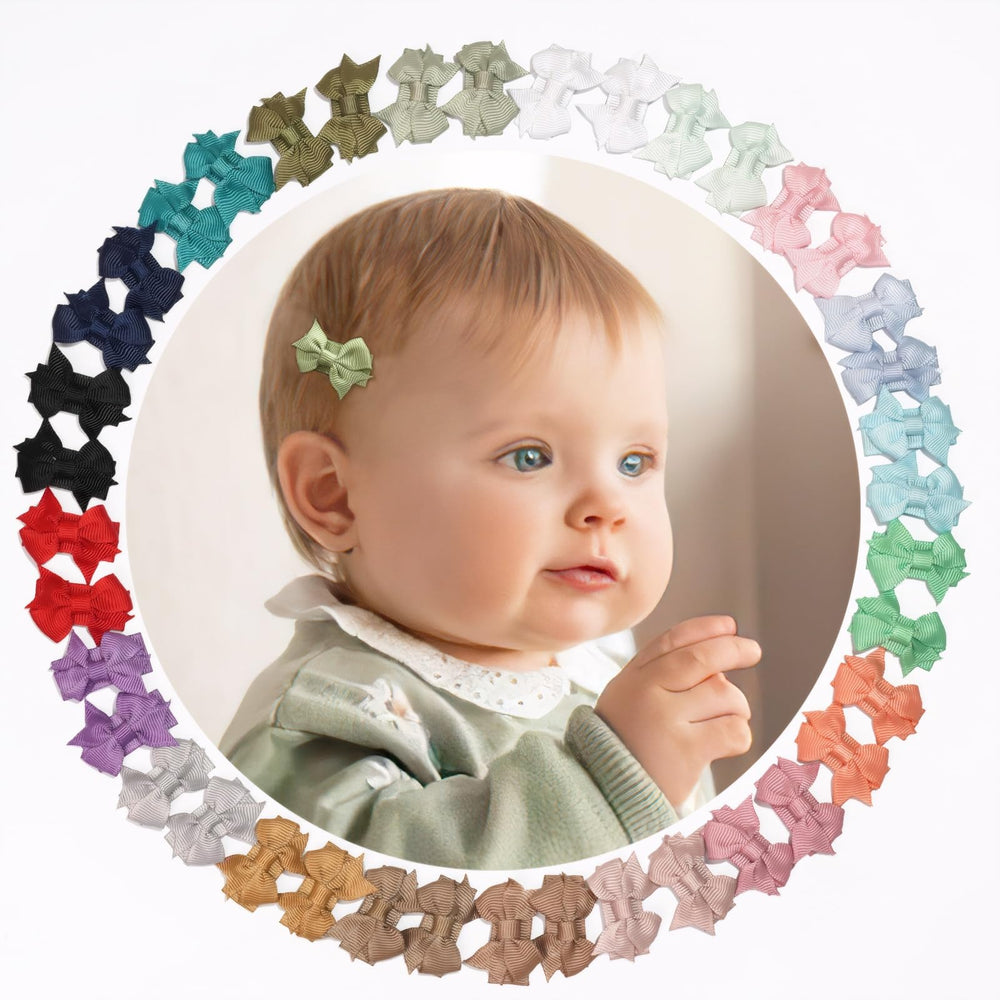 DED Mini Bow Snap Hair Clips pink closeup shows gentle secure hold on tiny hair.