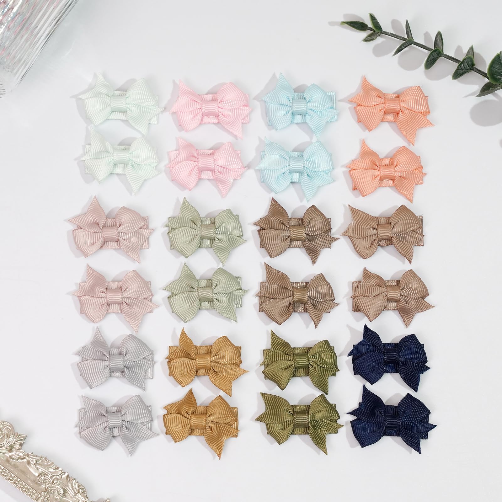 DED small bows styled for portrait sessions and gift-ready packaging