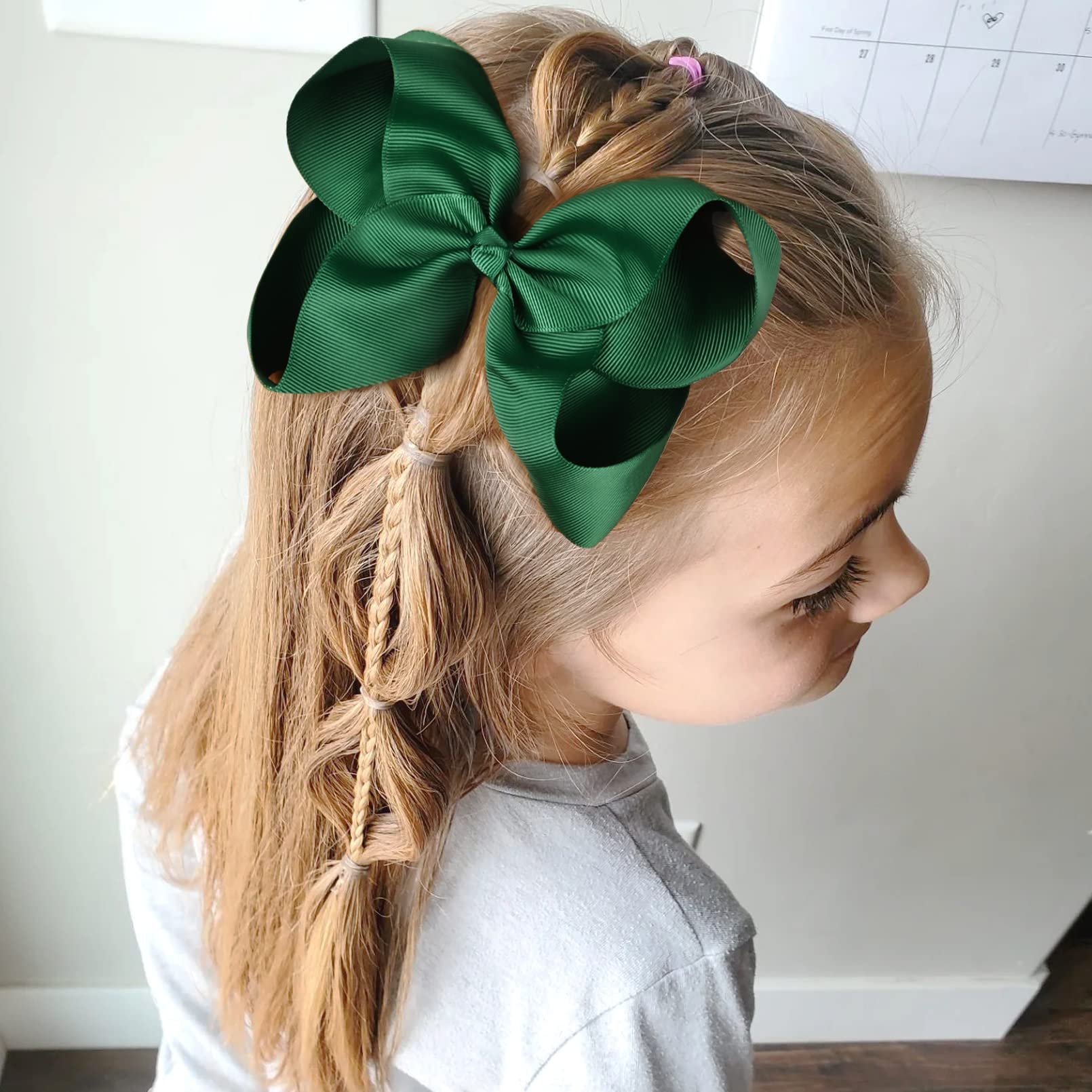 DEEKA alligator clip hair bow demonstrates sturdy attachment for busy mornings