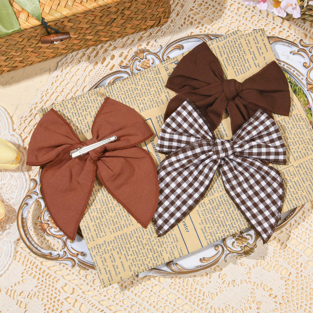 DEEKA alligator clip bow provides secure hold for braids and ponytails
