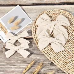 DEEKA beige knot bows in 4in for neat daytime wear