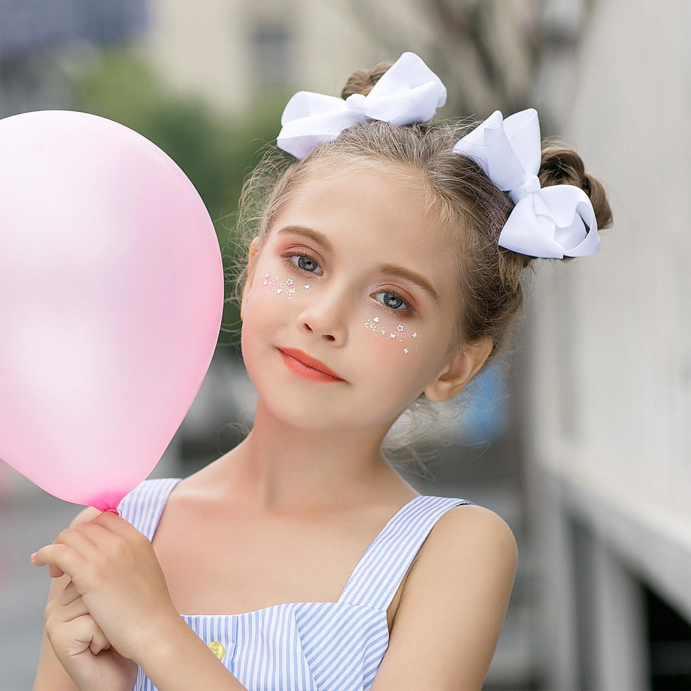 DEEKA bow headband provides a comfy decorative option for growing tresses