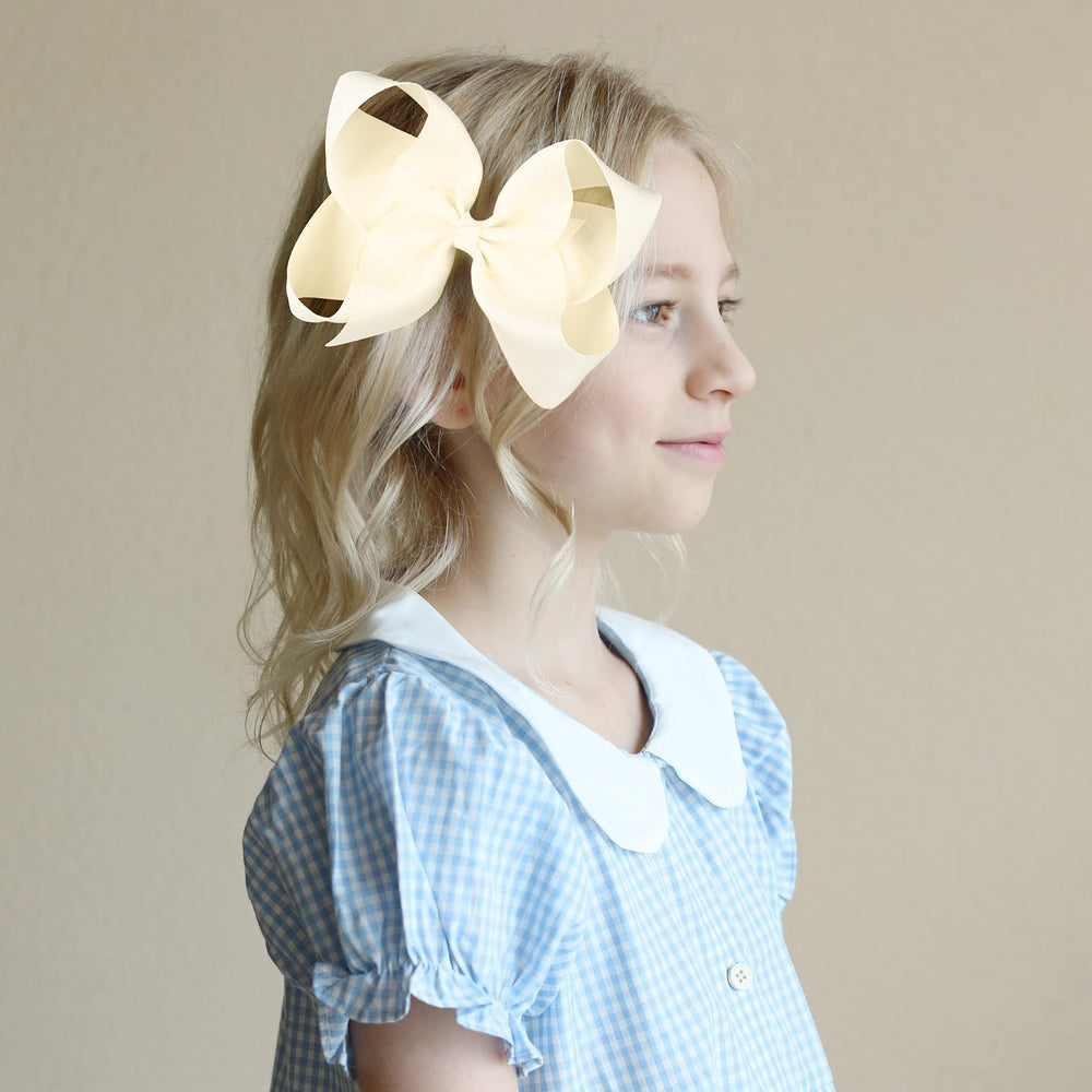 DEEKA hair bow clip ideal for toddlers and teens with gentle wear.