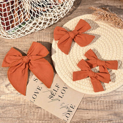 DEEKA 4-inch bow on bun demonstrates lightweight comfort all day