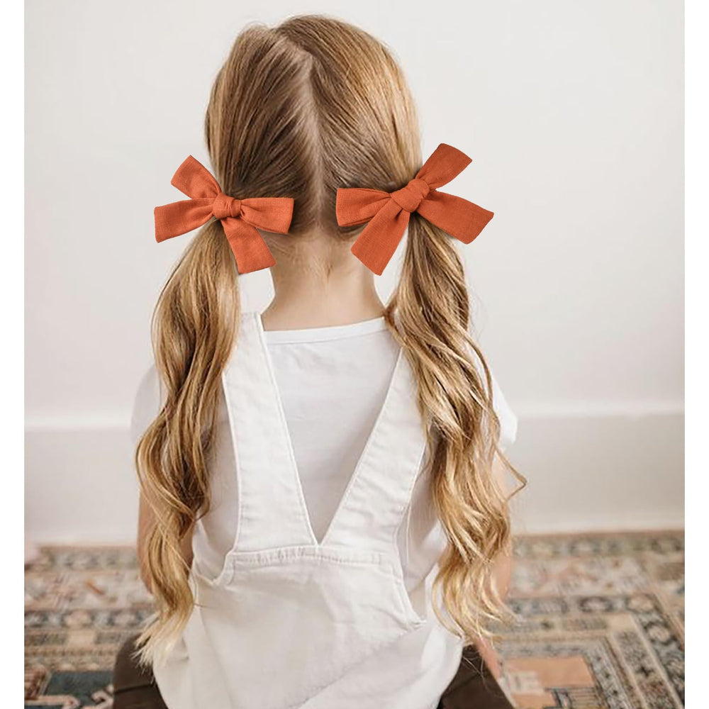 DEEKA burnt orange bow adds warm color to everyday school outfits