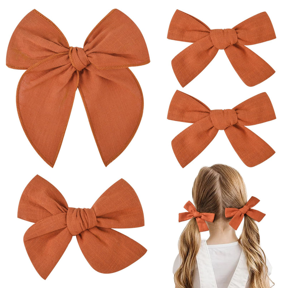 DEEKA burnt orange cotton-linen bow close-up shows soft fabric and gentle skin feel