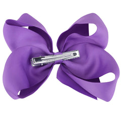 DEEKA hair bow clip closeup purple shows sturdy 2.2 inch alligator clip for secure hold.