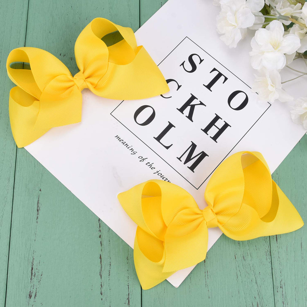 DEEKA ponytail with yellow bow shows quick styling