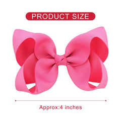 DEEKA handmade grosgrain bow with alligator clip for secure styling.