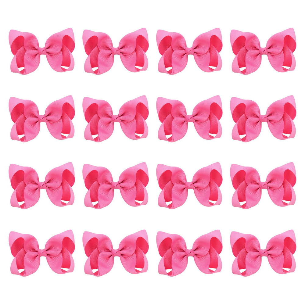 DEEKA hot pink 4-inch hair bow on a clip for quick outfits.
