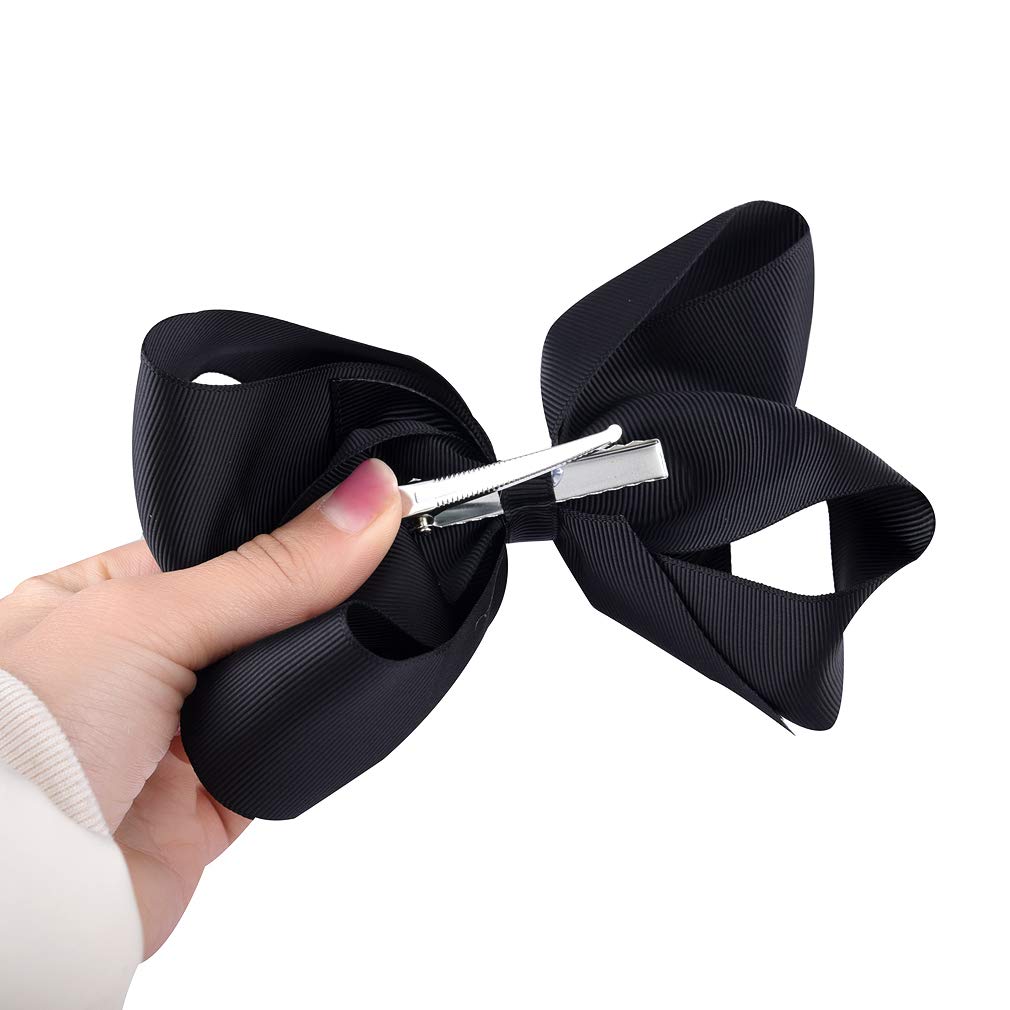 DEEKA large hair bow closeup demonstrates easy styling for back-to-school looks.