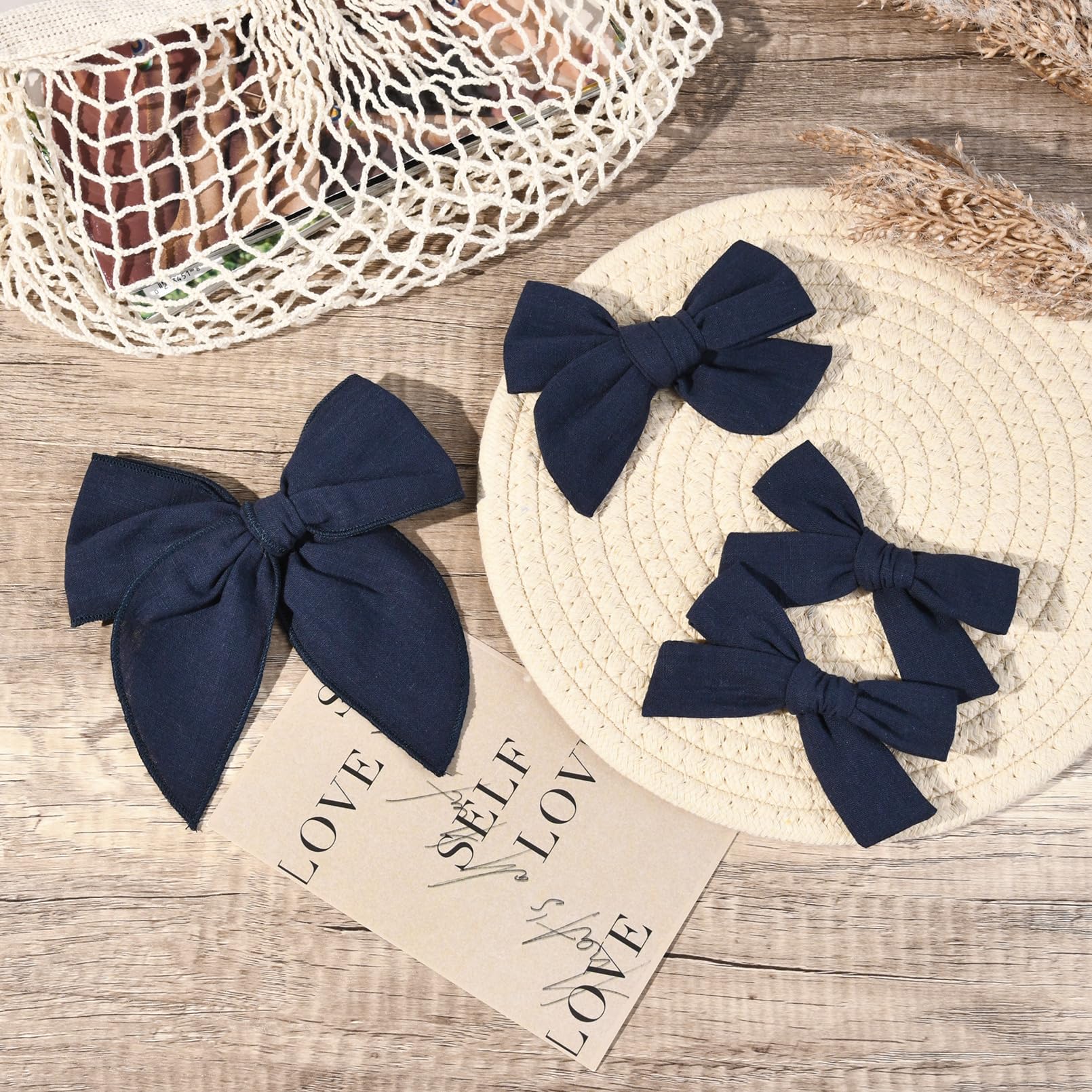 DEEKA navy blue 4-inch knot bow with clip, ideal for small ponytails and buns