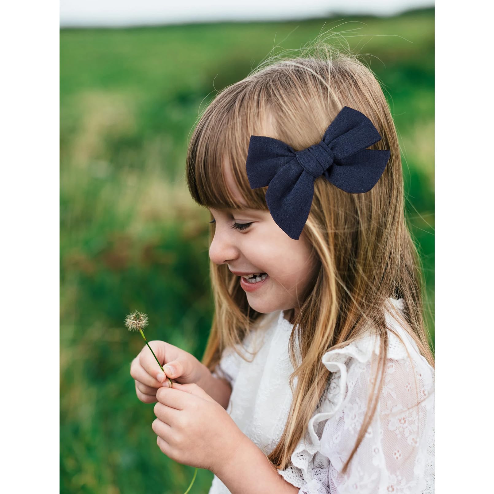 DEEKA navy blue bow complements half-up-do hairstyles for cute daily outfits
