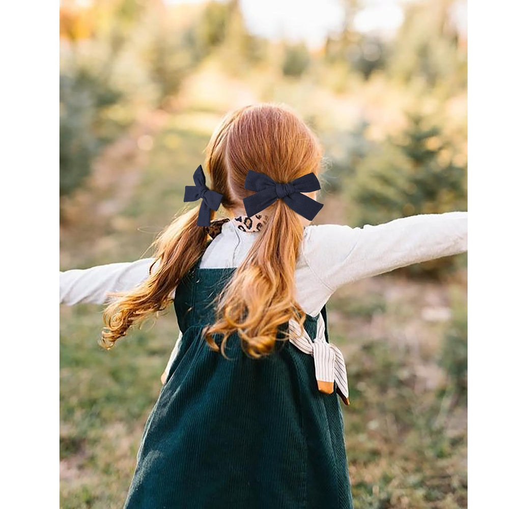 DEEKA navy blue cotton-linen bows offer three styles for varied looks and moods
