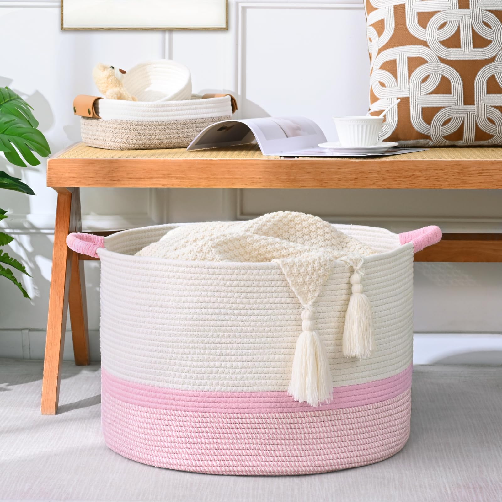 Degeyoyo blanket basket in living room blends neutral decor with practical storage.