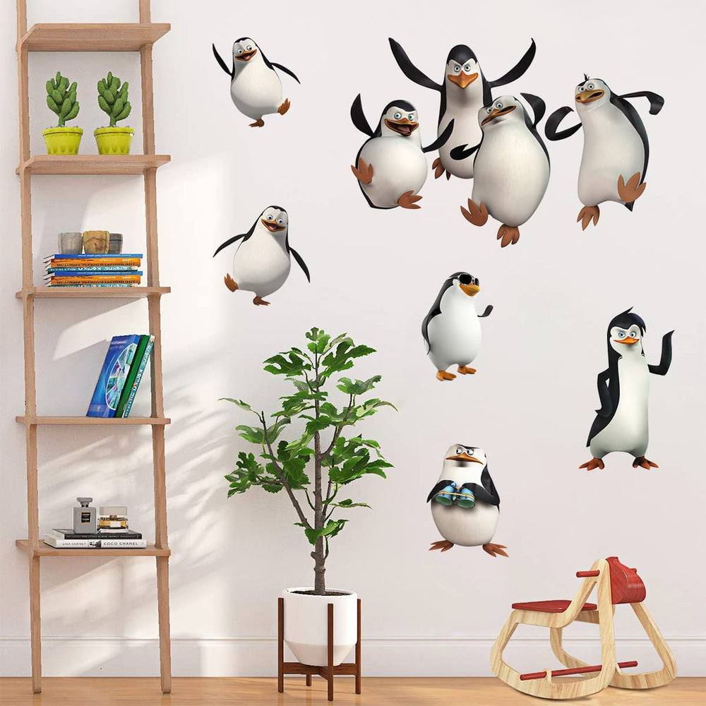 DEIKOKA penguin sticker pack shown on walls and furniture.