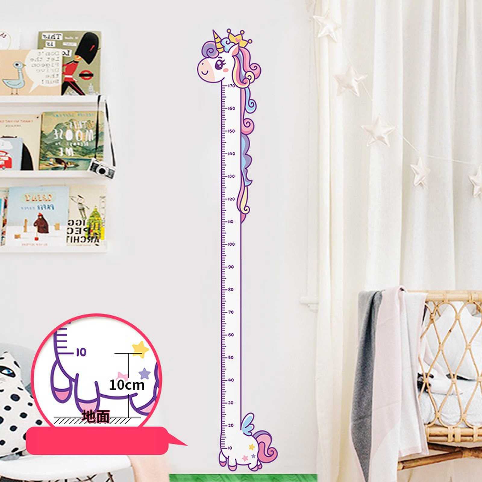 DEKMILE vinyl growth chart unicorn wall decal on a nursery wall for height tracking.