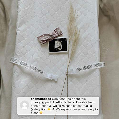 Delta Children Beautyrest foam contoured pad with harness buckle keeps baby safely seated during changes