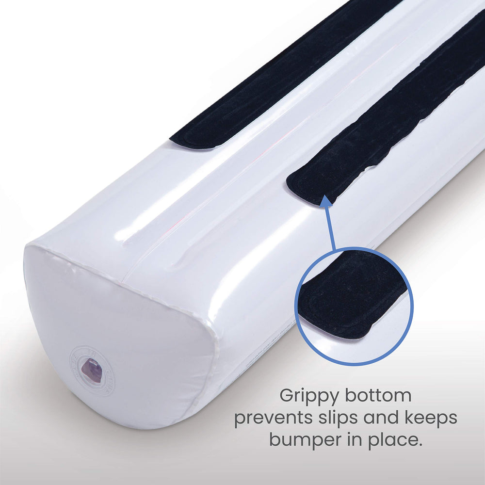 Delta Children bed rails tucked under sheet for clean appearance