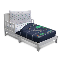 Delta Children reversible comforter with elastic bottom stays in place for easy bed-making.