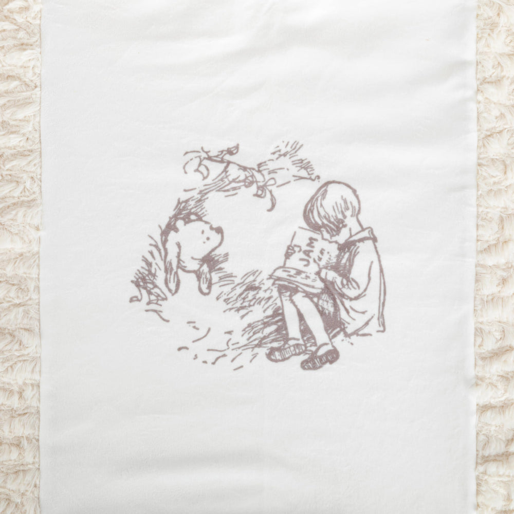 DEMDACO Pooh Classic Yellow Bear blanket close-up of soft cotton-poly fabric for gentle warmth.