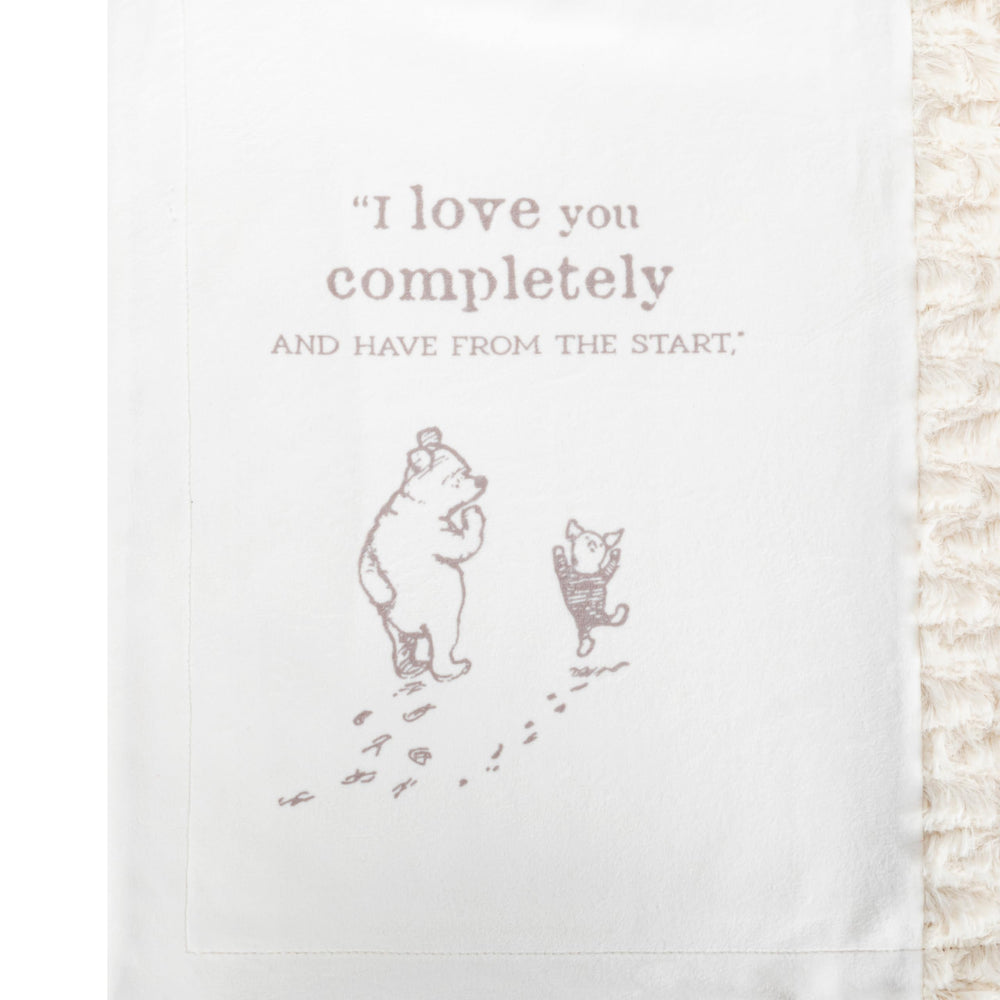 DEMDACO Pooh Classic Yellow Bear blanket packaging, ready for gifting at baby showers.